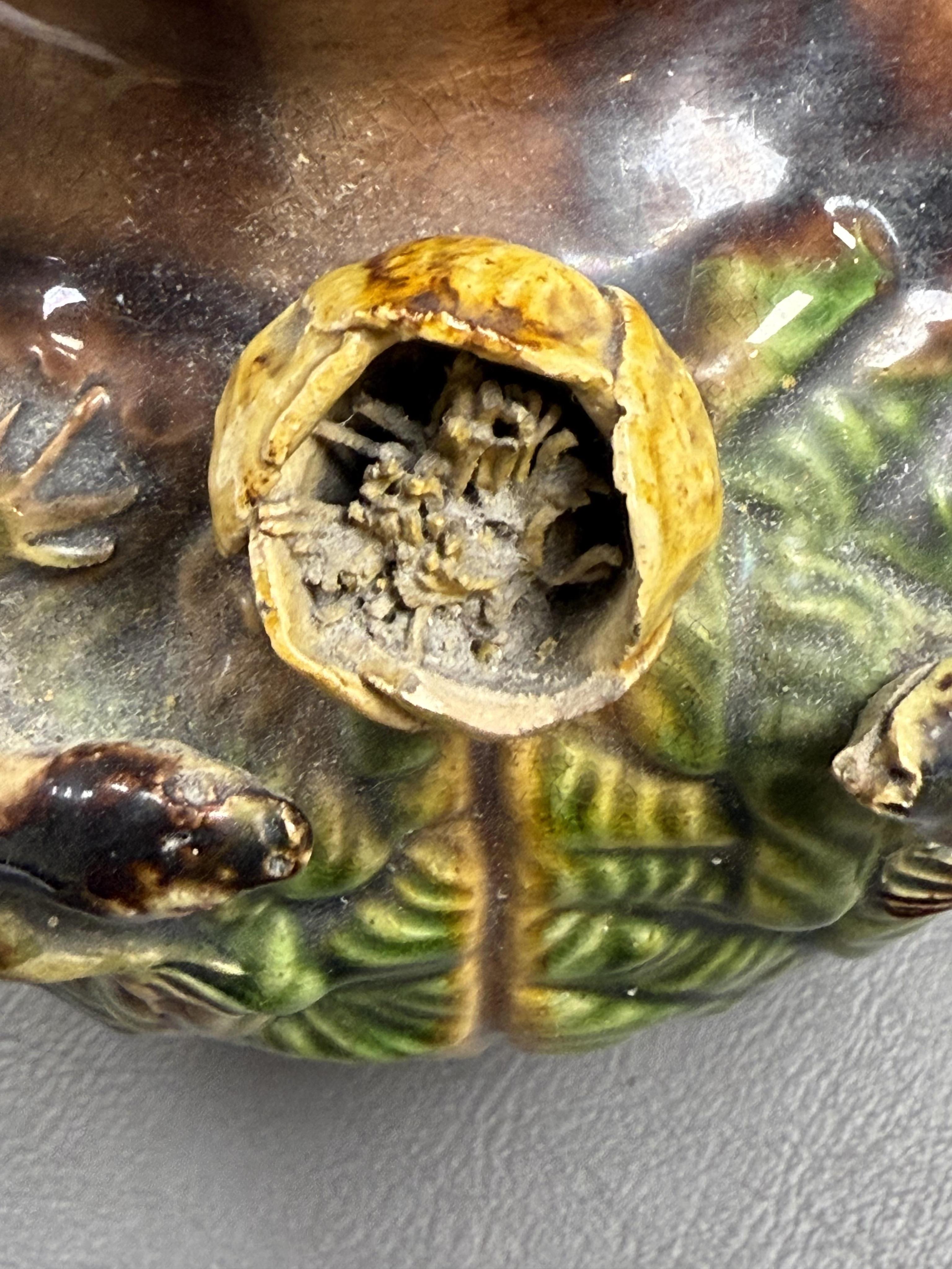 A pair of Palissy ware two handled vases, by Mafra Caldas Da Rainha, late 19th century